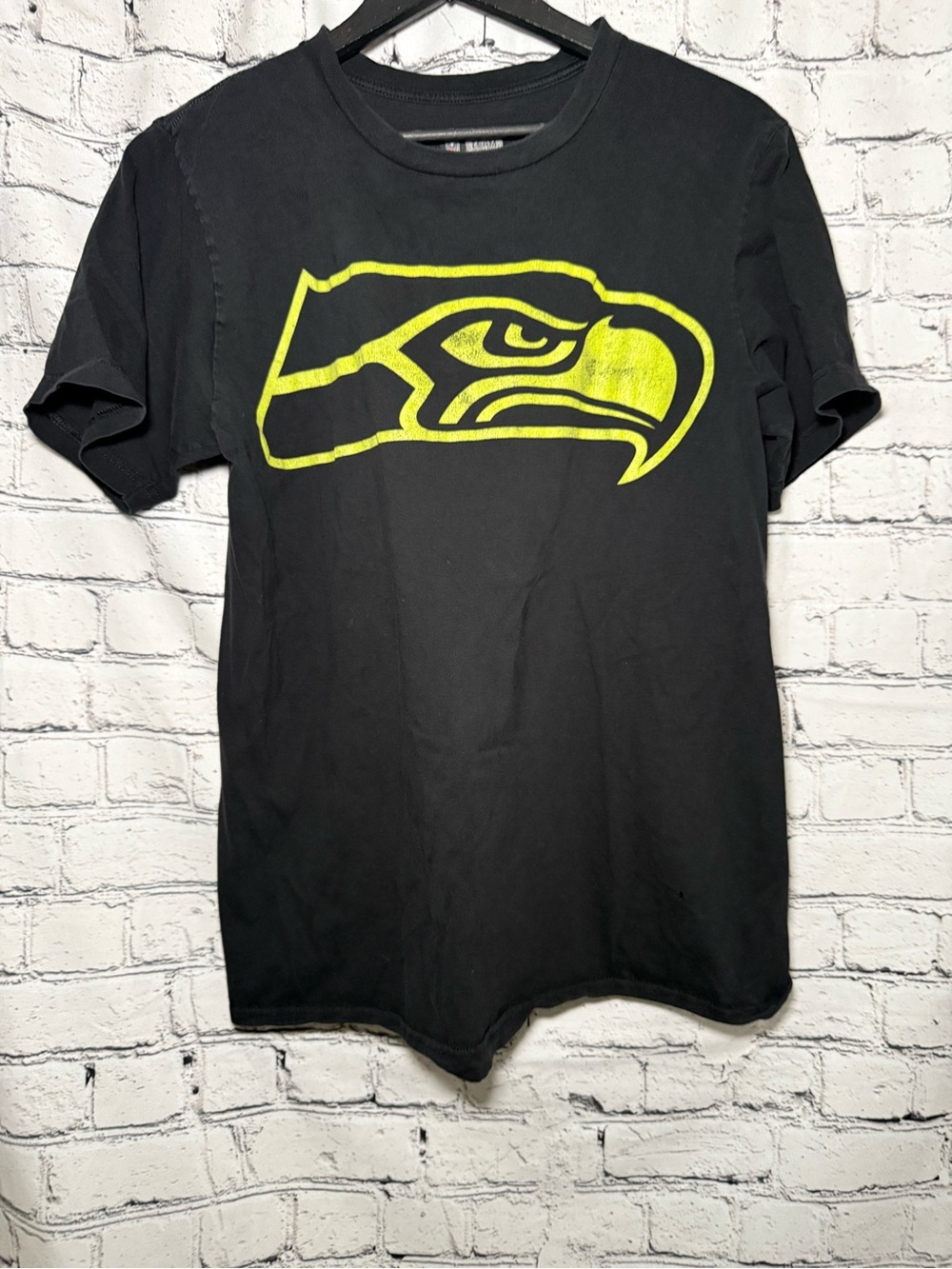 NFL. Black graphic Tshirt. Size M